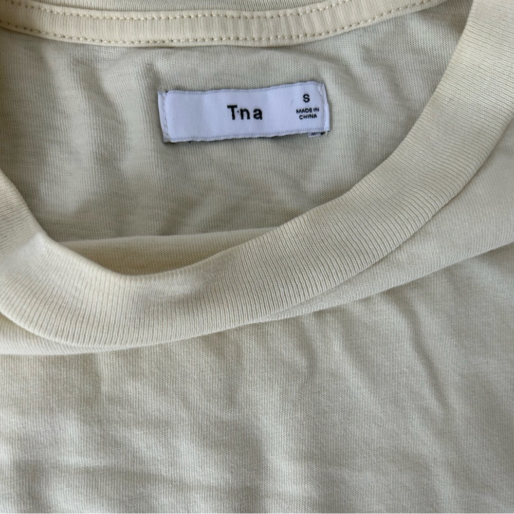 pastel yellow TNA cropped long sleeves shirt